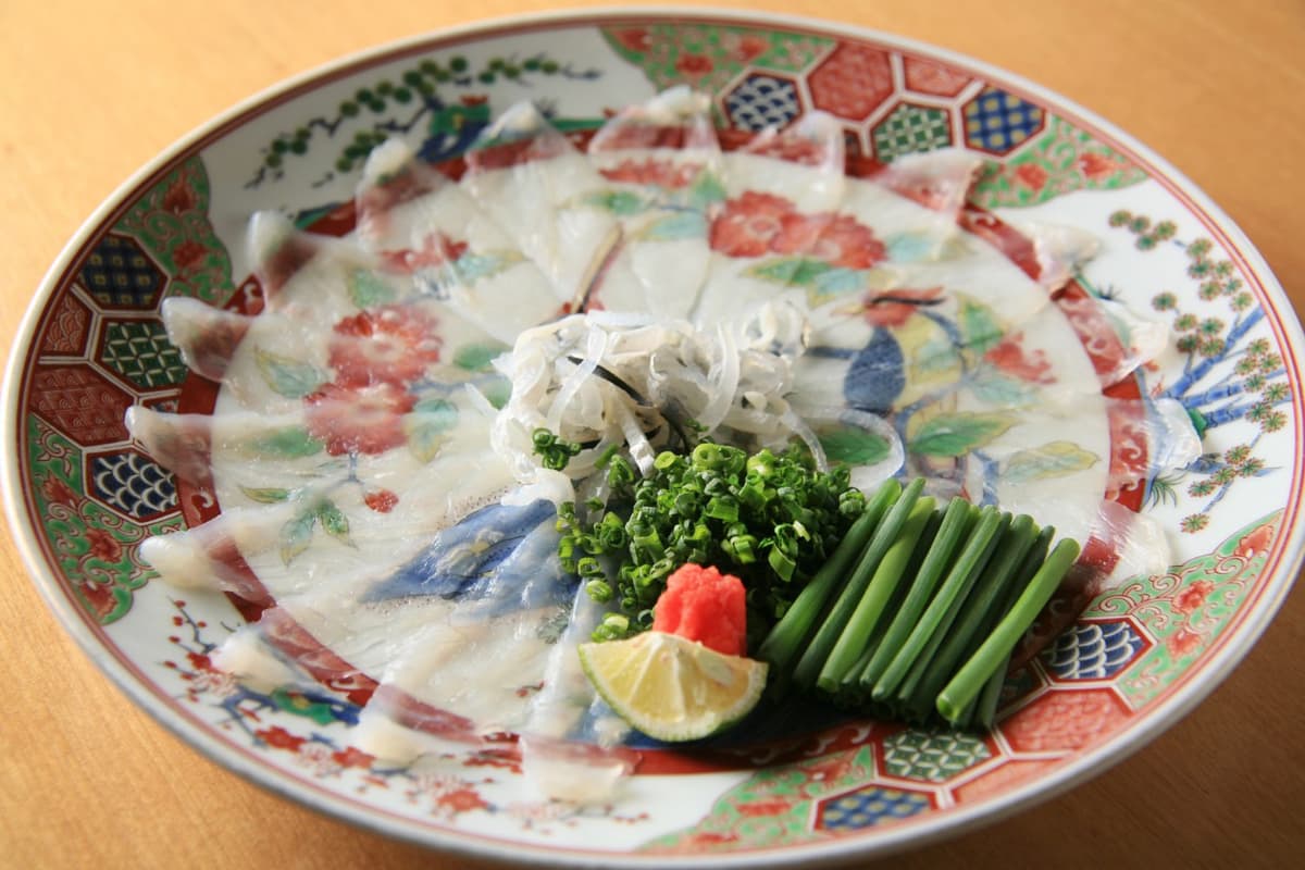 Fugu sashimi, made from pufferfish, is a delicacy requiring careful preparation.
